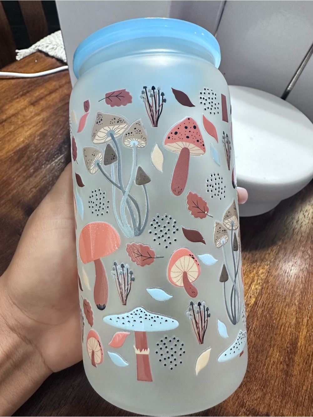 Blue-Trim Frosted Glass Vase with Coral and Tan Mushroom Motif